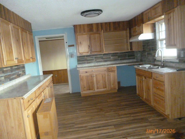 14765 Highway 70 East Huntingdon, TN 38344 - Photo 9 of 11 a kitchen with stainless steel appliances granite countertop a sink and a wooden cabinets