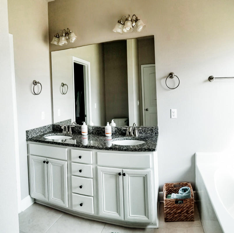 118 Pin Oak Loop Santa Rosa Beach, FL 32459 - Photo 12 of 15 a bathroom with a granite countertop sink and a mirror