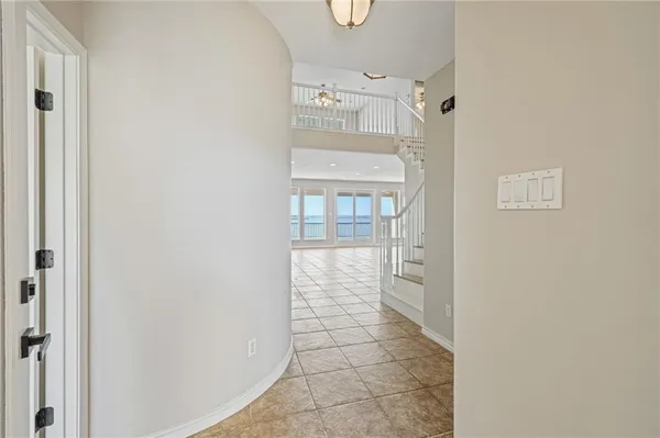 a bathroom with a shower and a mirror
