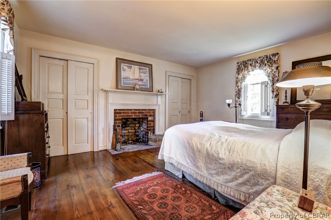 15 Paynes Shop Road Lancaster, VA 22503 - Photo 13 of 26 First floor bedroom with masonry fireplace