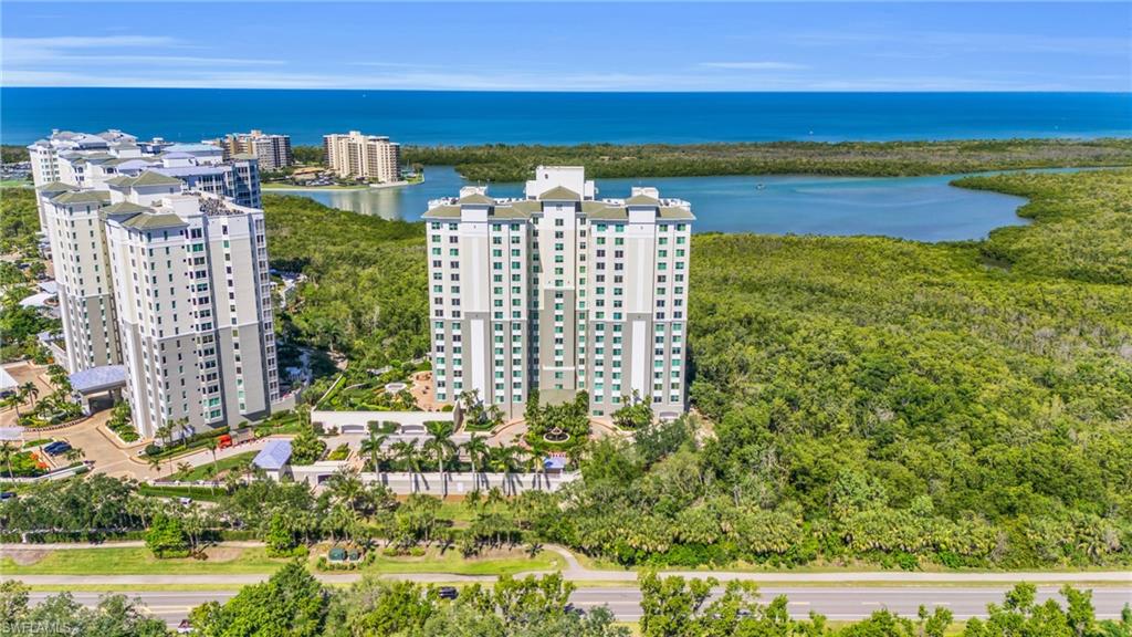 265 Indies Way, Unit 1402 Naples, FL 34110 - Photo 5 of 44 Aerial view featuring a water view