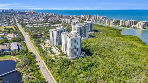 a view of a city with lawn chairs