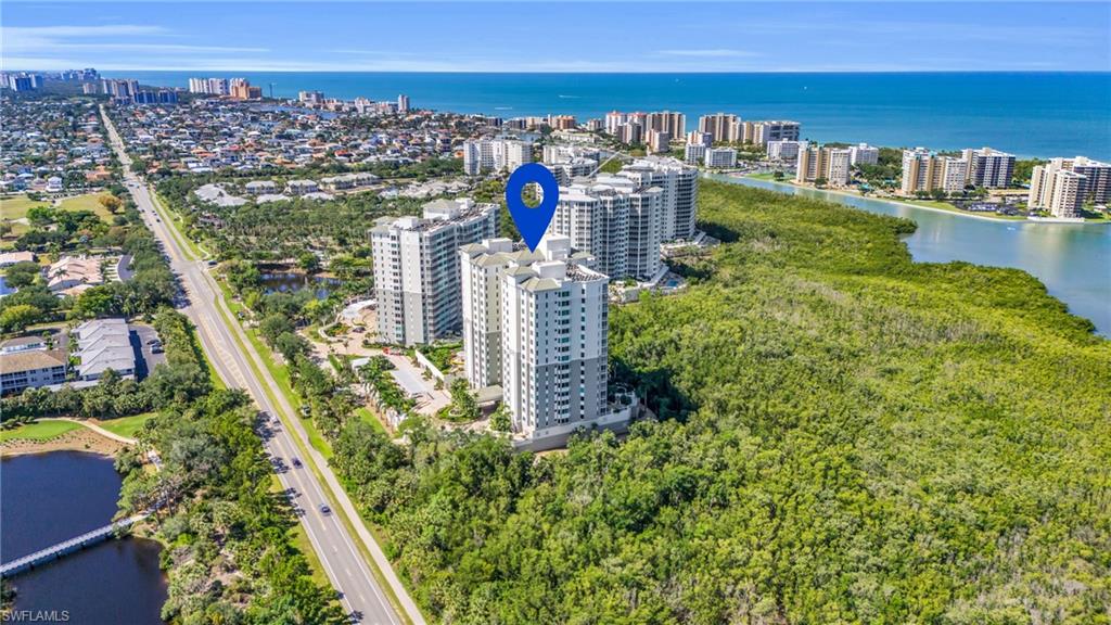 265 Indies Way, Unit 1402 Naples, FL 34110 - Photo 7 of 44 Bird's eye view featuring a water view