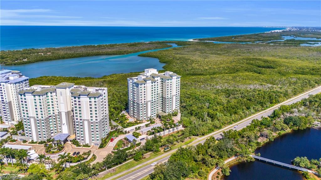 265 Indies Way, Unit 1402 Naples, FL 34110 - Photo 9 of 45 a view of a city and an ocean view