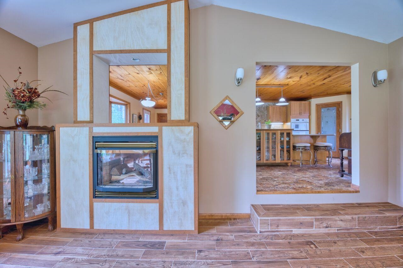 9220 Biss Road Britt, MN 55710 - Photo 5 of 50 Interior space featuring vaulted ceiling, wood finished floors, and wooden ceiling