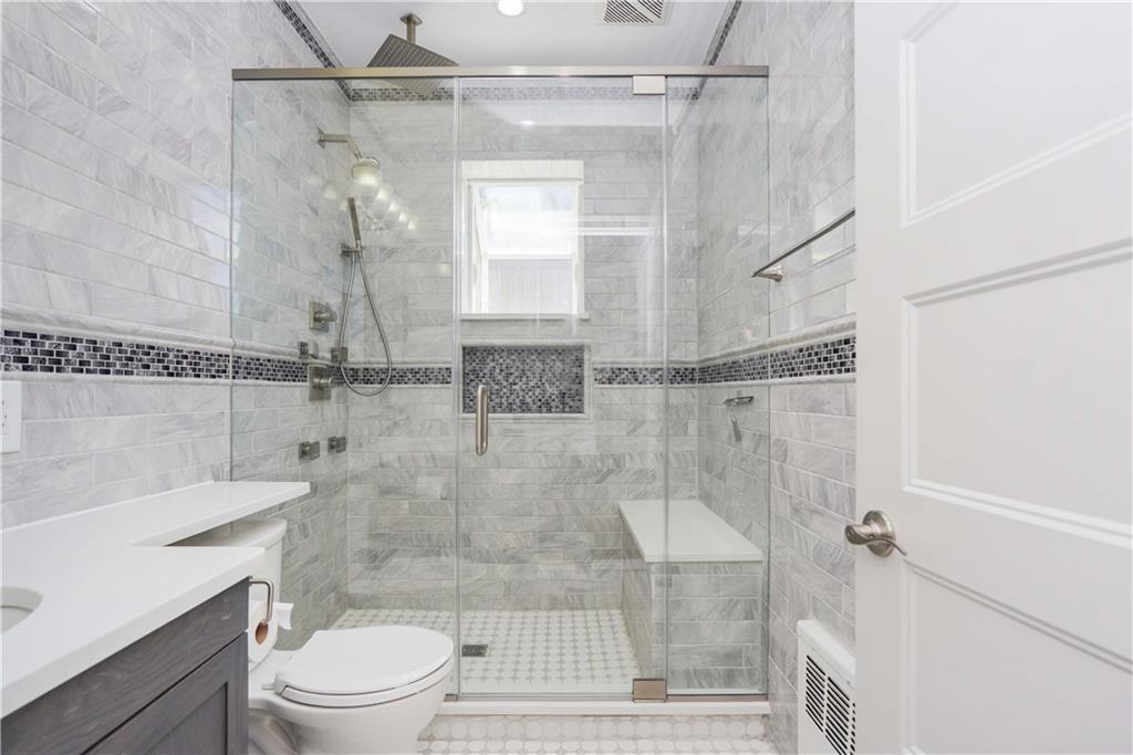793 Westminster Road Brooklyn, NY 11230 - Photo 14 of 47 a bathroom with a shower and a toilet