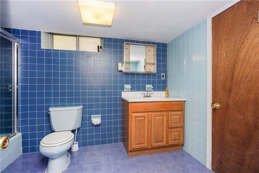 793 Westminster Road Brooklyn, NY 11230 - Photo 47 of 47 a bathroom with a sink and a toilet