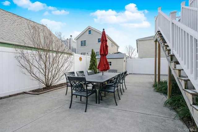 a view of a chairs and table in the terrace