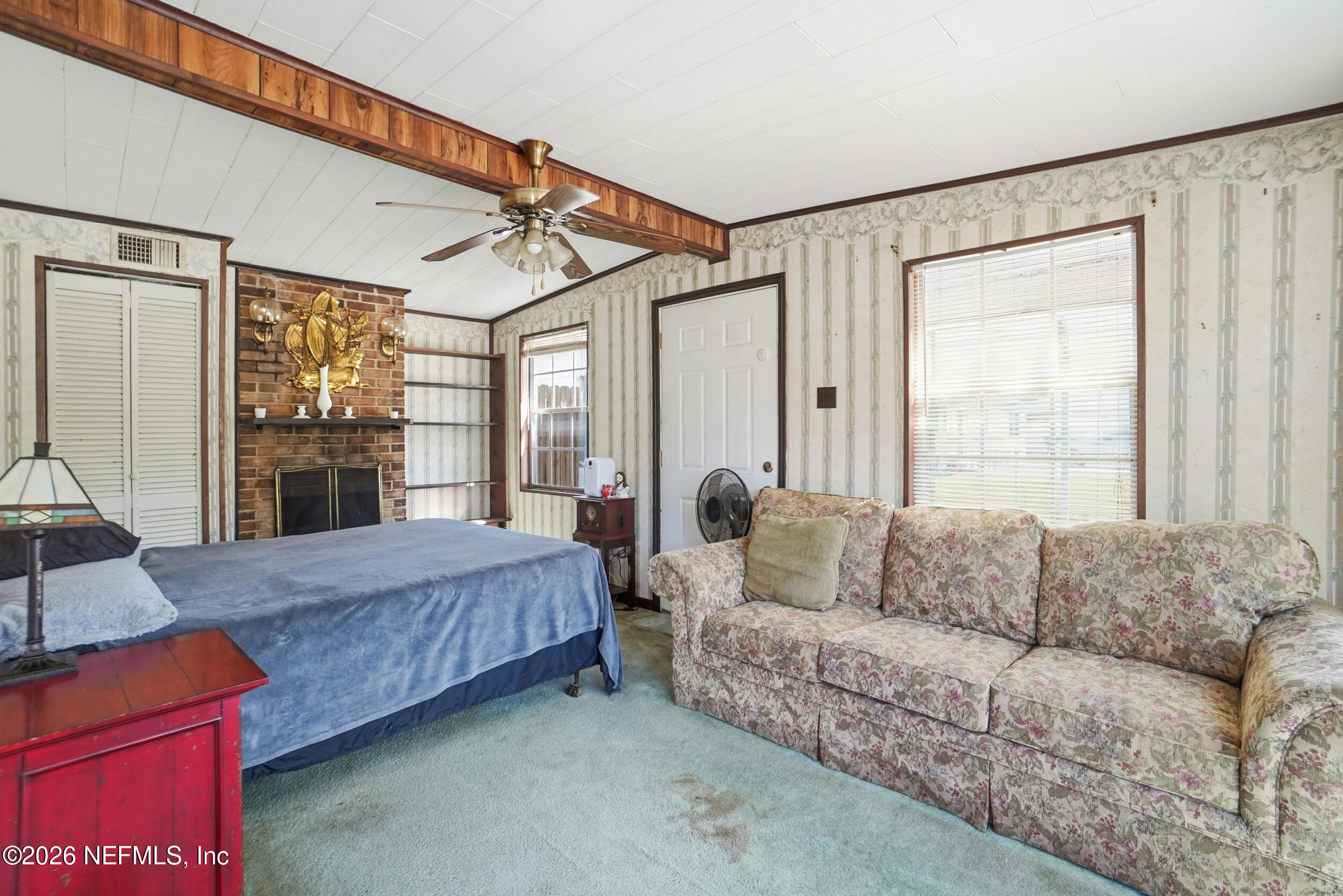43 Forrestal Circle North Atlantic Beach, FL 32233 - Photo 16 of 39 a living room with furniture and a window