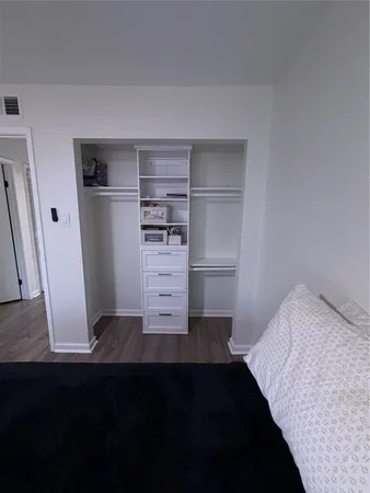 wooden floor and window in a room