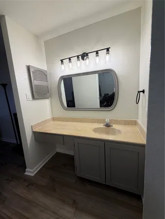 a view of a swimming pool with a yard