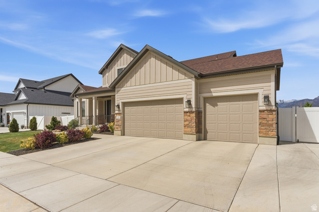 1434 West Stable Street Lindon, UT 84042 - Photo 6 of 76 Craftsman house featuring a gate, a garage, board and batten siding, driveway, and a shingled roof