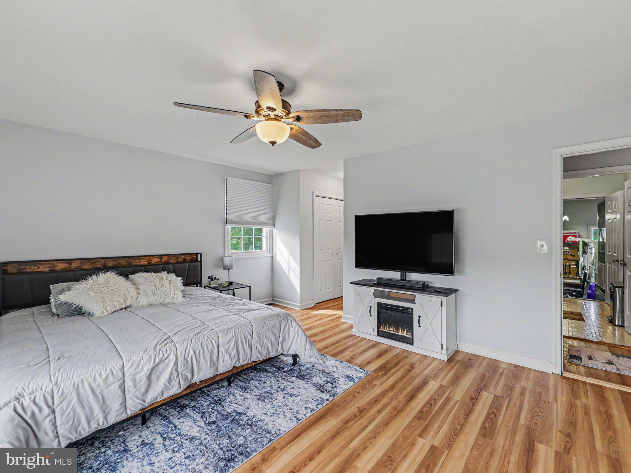 34340 Parker Road Locust Grove, VA 22508 - Photo 13 of 27 Serene bedroom with modern charm.