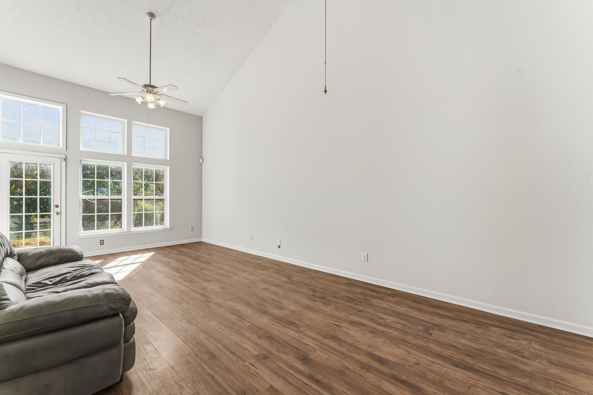 3401 Anderson Road, Unit 80 Antioch, TN 37013 - Photo 13 of 39 a view of empty room with wooden floor and fan
