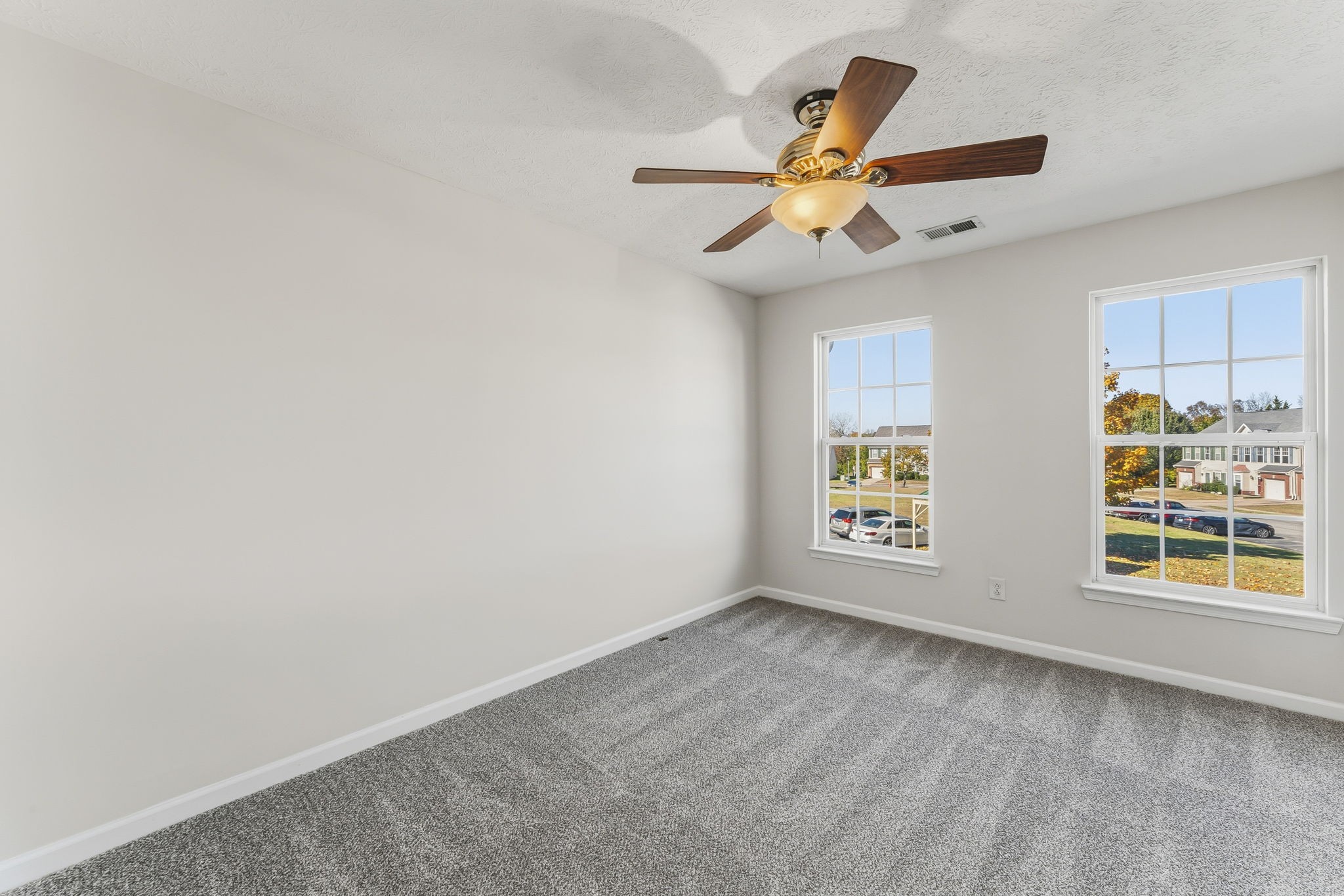 3401 Anderson Road, Unit 80 Antioch, TN 37013 - Photo 28 of 39 an empty room with windows and fan