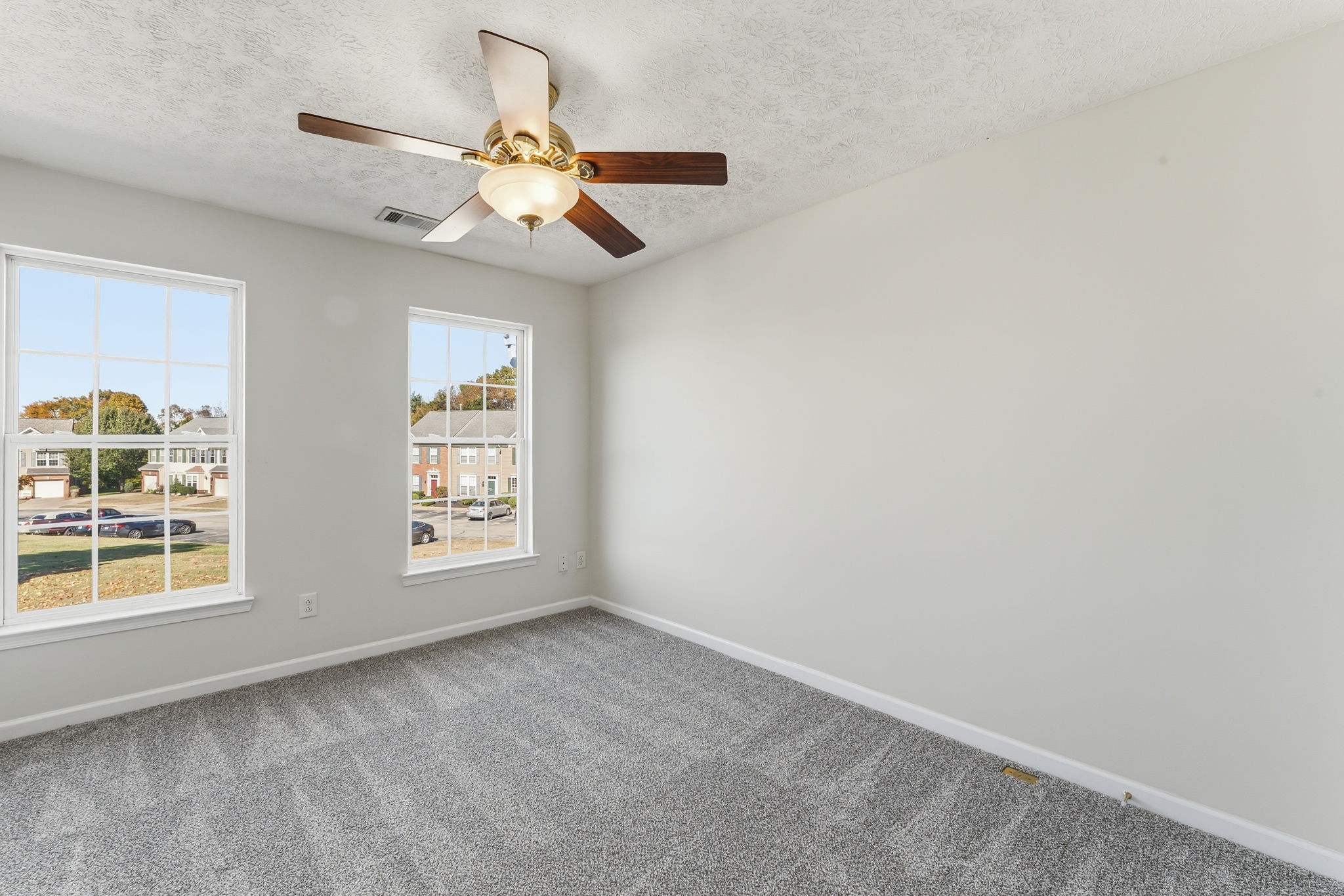 3401 Anderson Road, Unit 80 Antioch, TN 37013 - Photo 31 of 39 an empty room with windows and fan