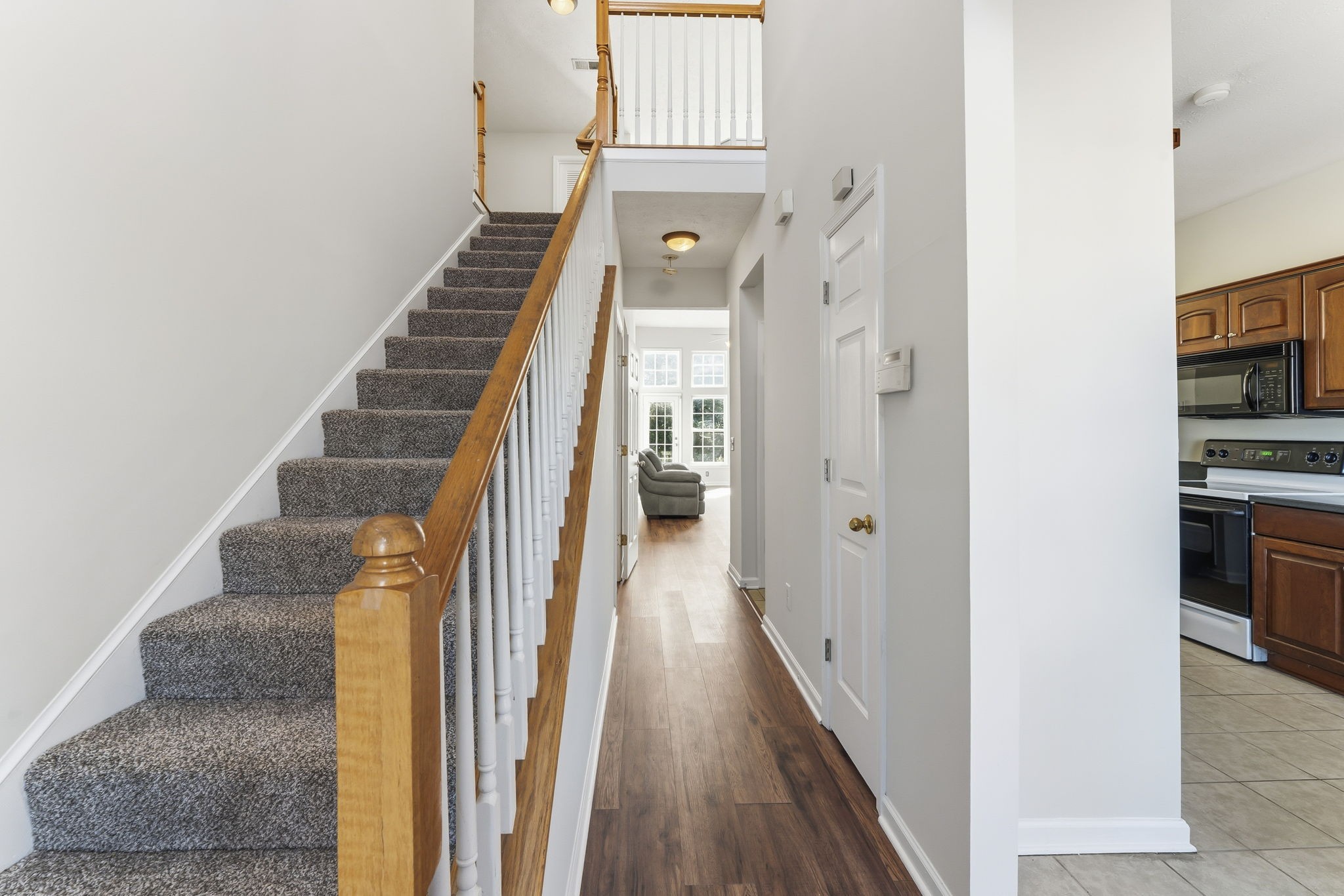 3401 Anderson Road, Unit 80 Antioch, TN 37013 - Photo 6 of 39 a view of a hallway with wooden floor and staircase