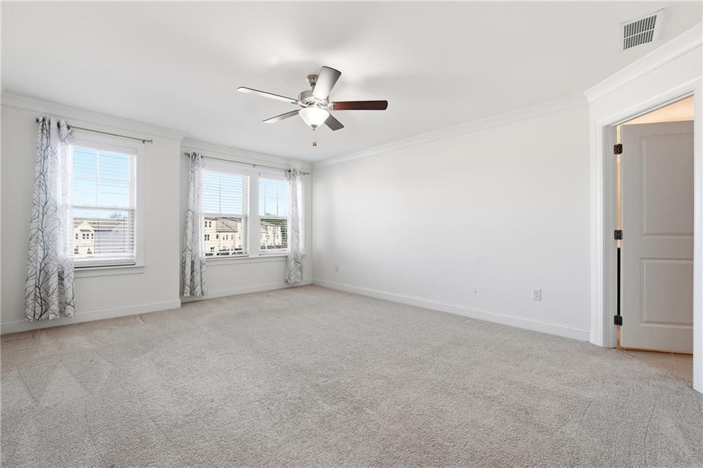 3425 Hardy Street Cumming, GA 30041 - Photo 15 of 25 a view of an empty room with a window