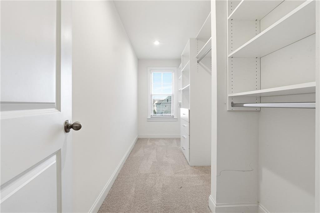 3425 Hardy Street Cumming, GA 30041 - Photo 21 of 25 a view of a hallway with closet