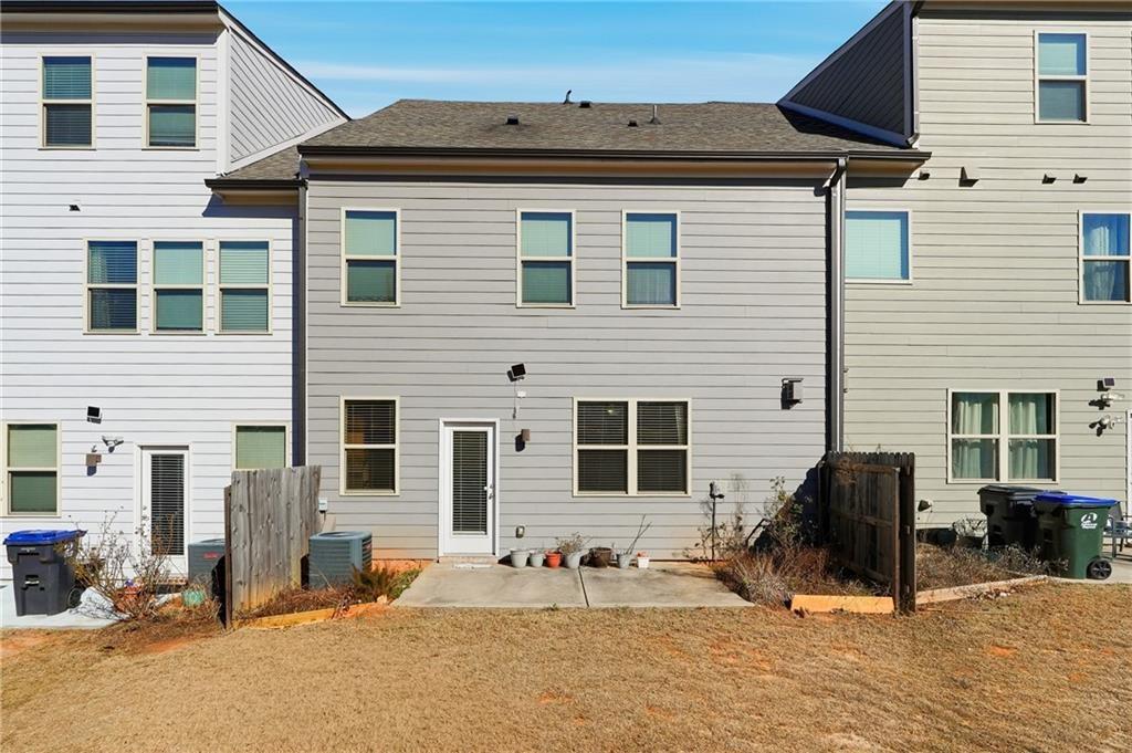 3425 Hardy Street Cumming, GA 30041 - Photo 24 of 25 a view of a house with a patio