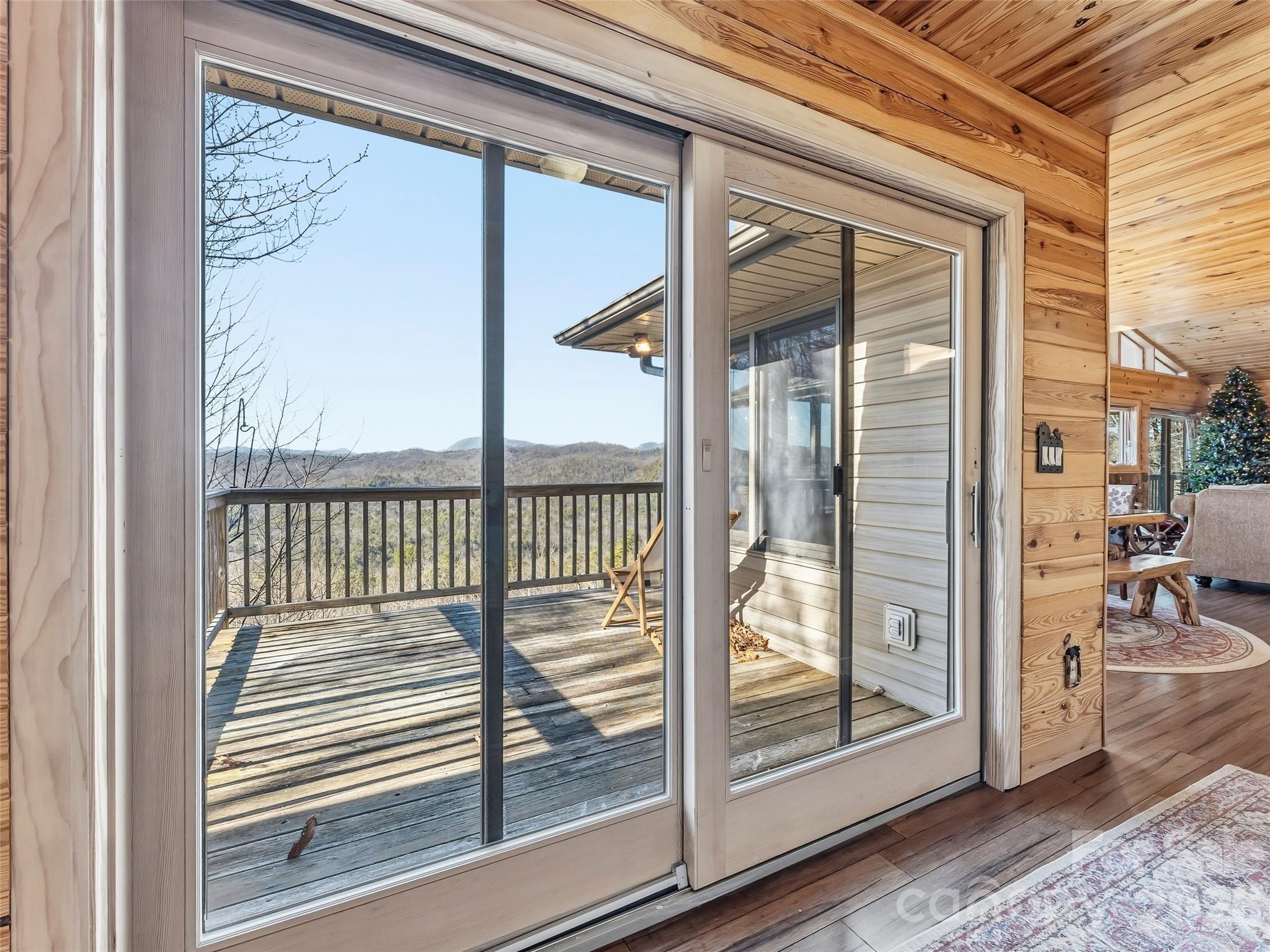 101 Ruffed Grouse Road Brevard, NC 28712 - Photo 24 of 38 a view of a glass door and a living room