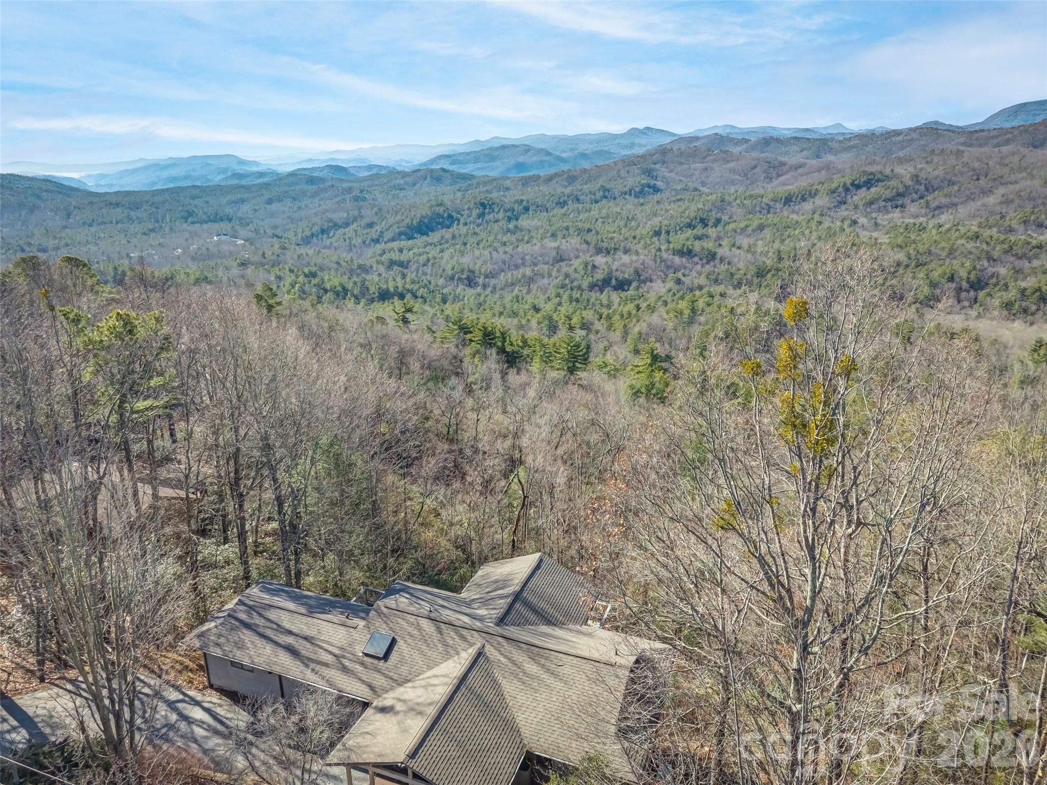 101 Ruffed Grouse Road Brevard, NC 28712 - Photo 3 of 38 a view of a large mountain with a mountain in the background