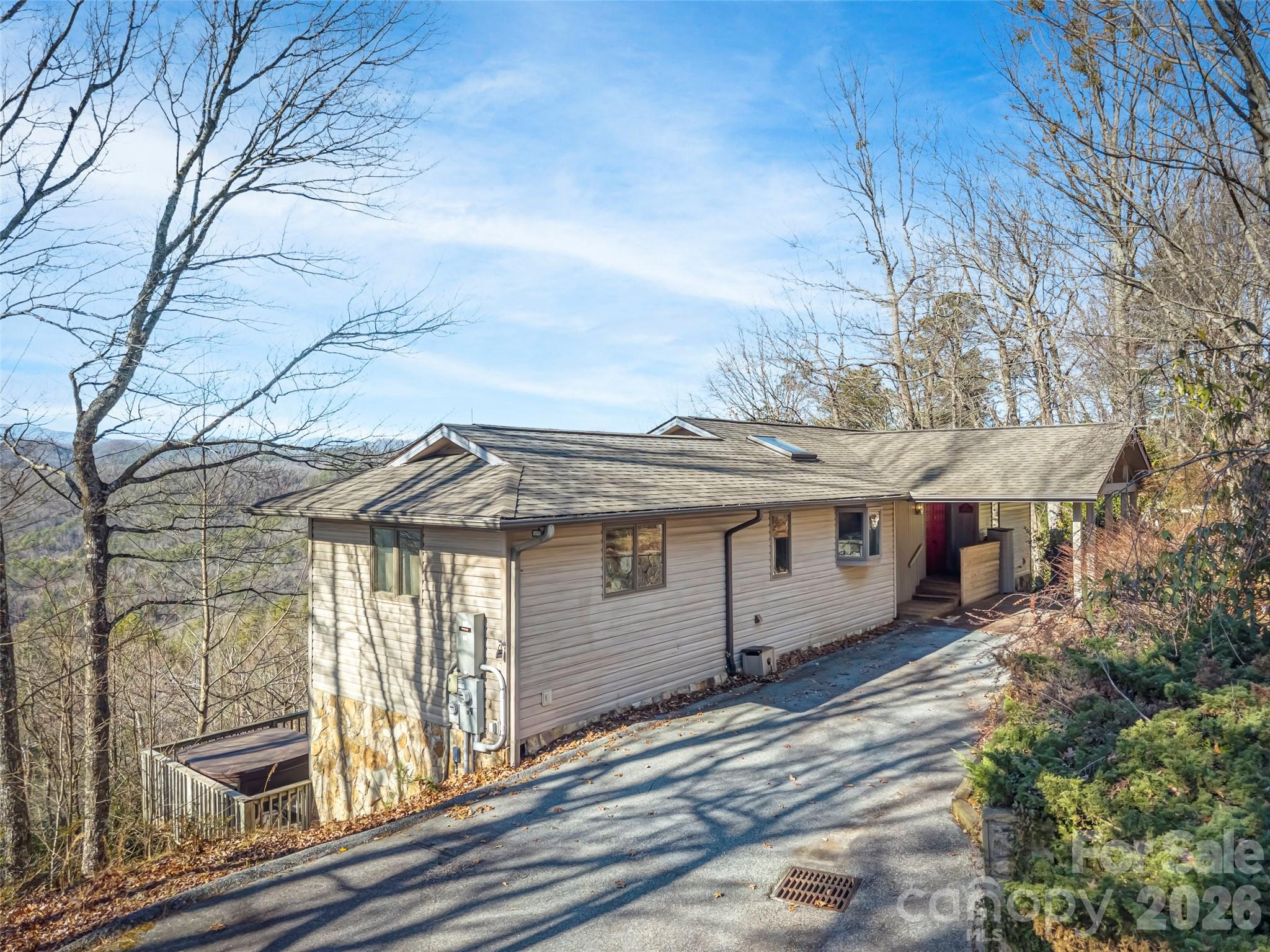 101 Ruffed Grouse Road Brevard, NC 28712 - Photo 6 of 38 front view of a house with a wooden fence