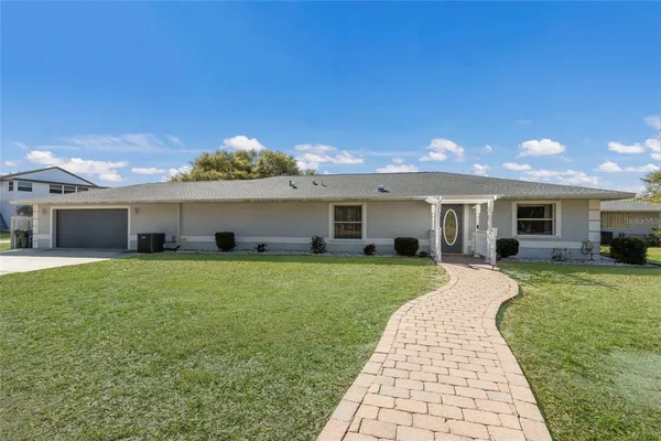 a front view of house with yard