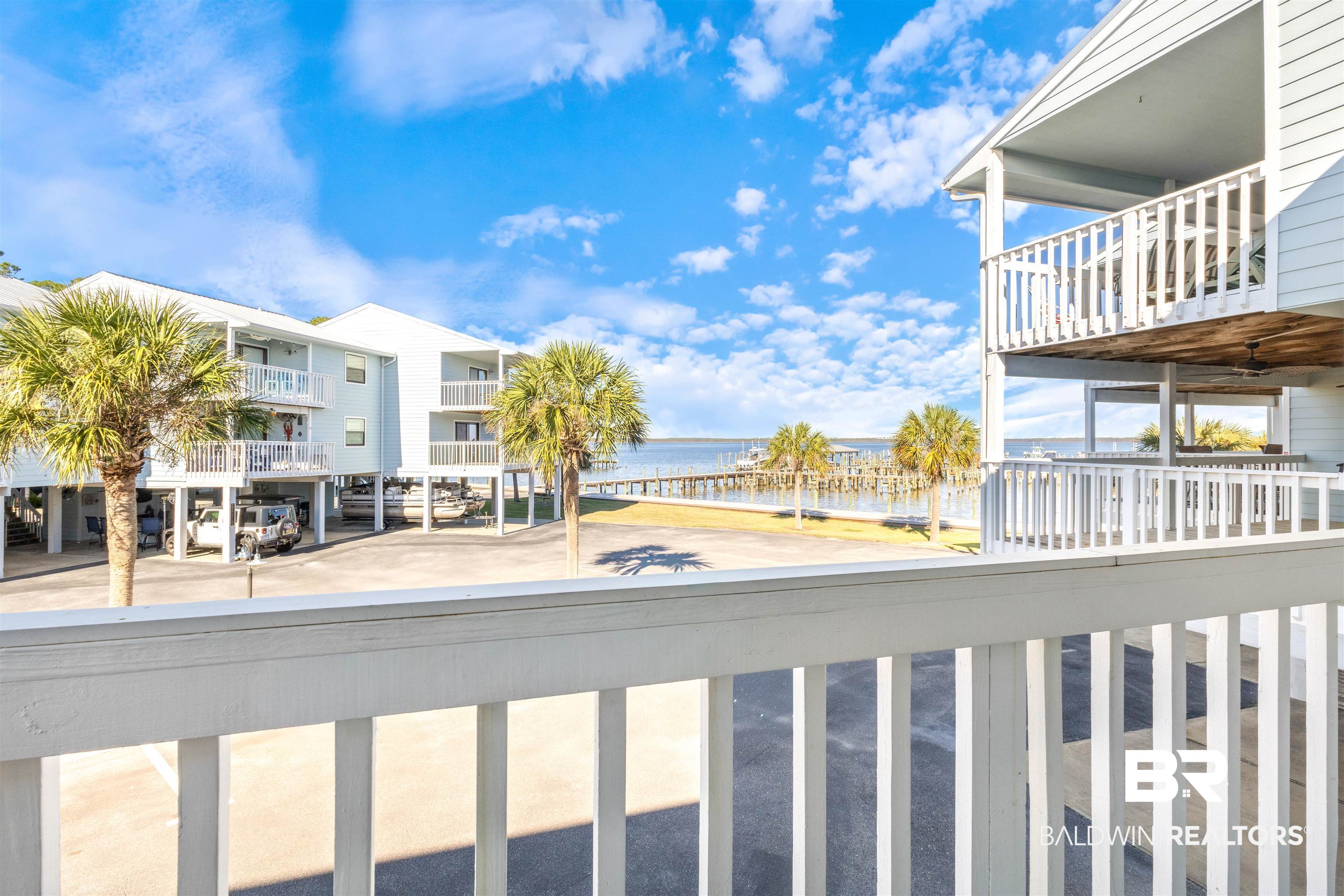 25861 Canal Road, Unit 3 Orange Beach, AL 36561 - Photo 22 of 40 Balcony featuring a water view