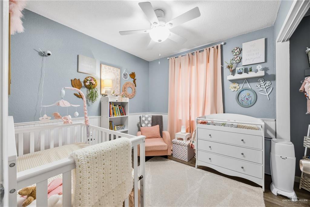 2004 Hawk Avenue McAllen, TX 78504 - Photo 11 of 15 a bedroom with furniture and a window