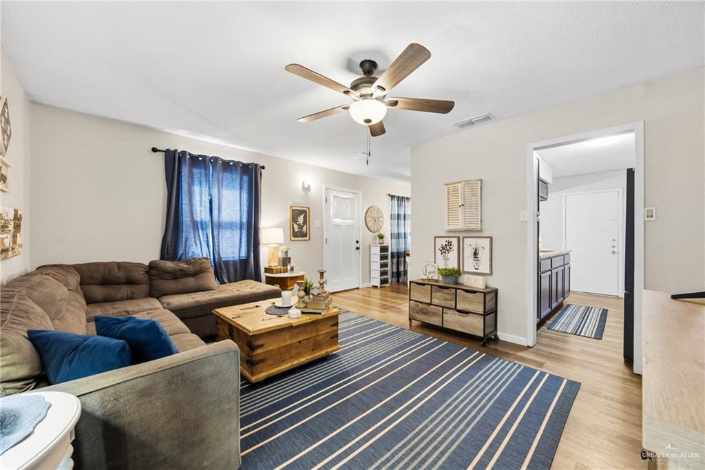 2004 Hawk Avenue McAllen, TX 78504 - Photo 3 of 15 a living room with furniture and wooden floor