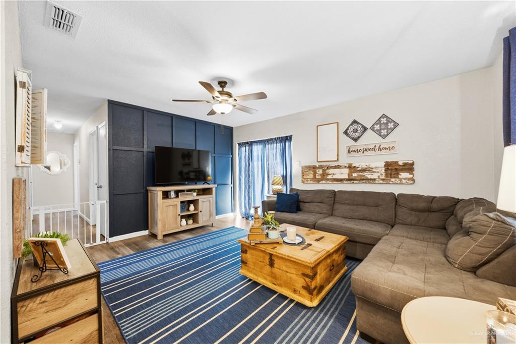 2004 Hawk Avenue McAllen, TX 78504 - Photo 4 of 15 a living room with furniture and a flat screen tv
