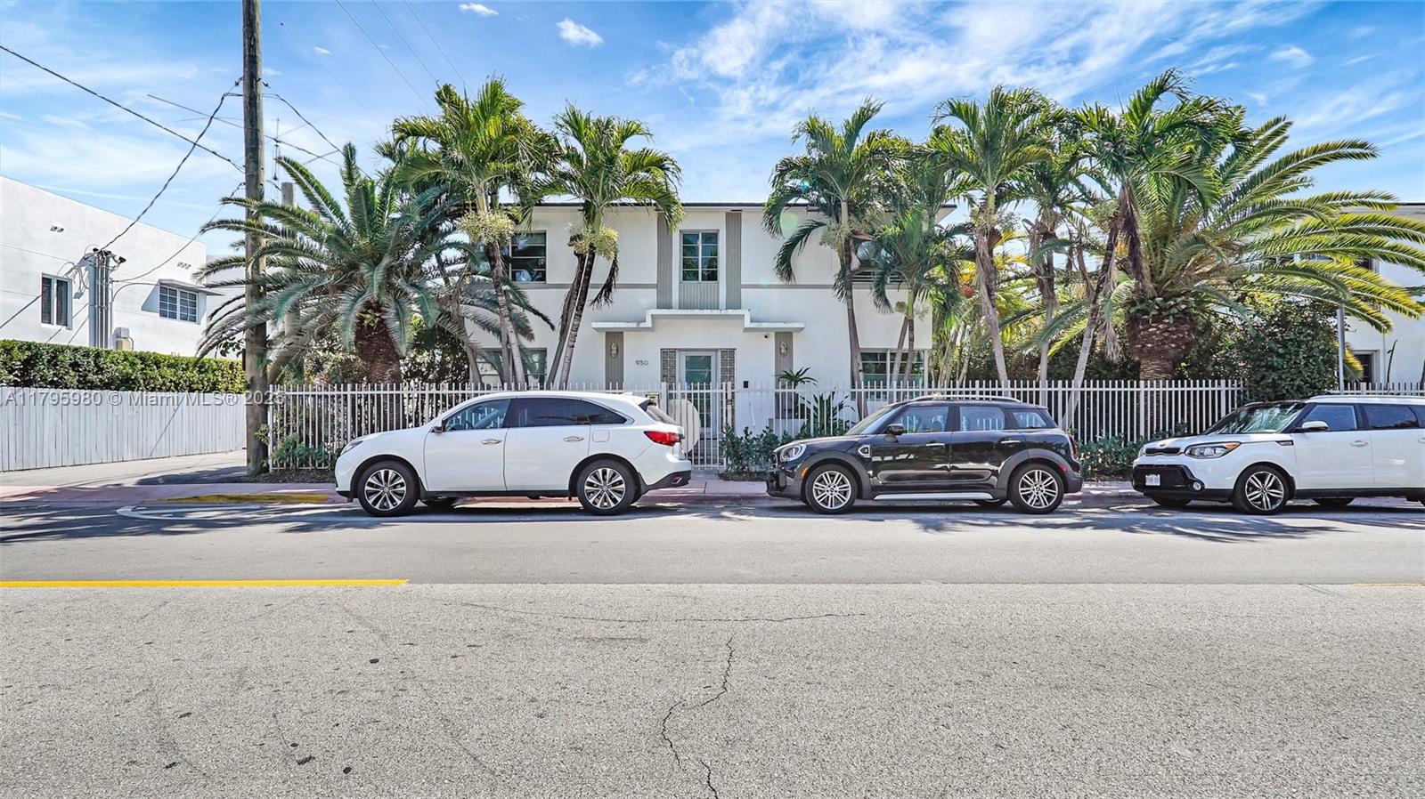 a view of a cars parked in front of a house