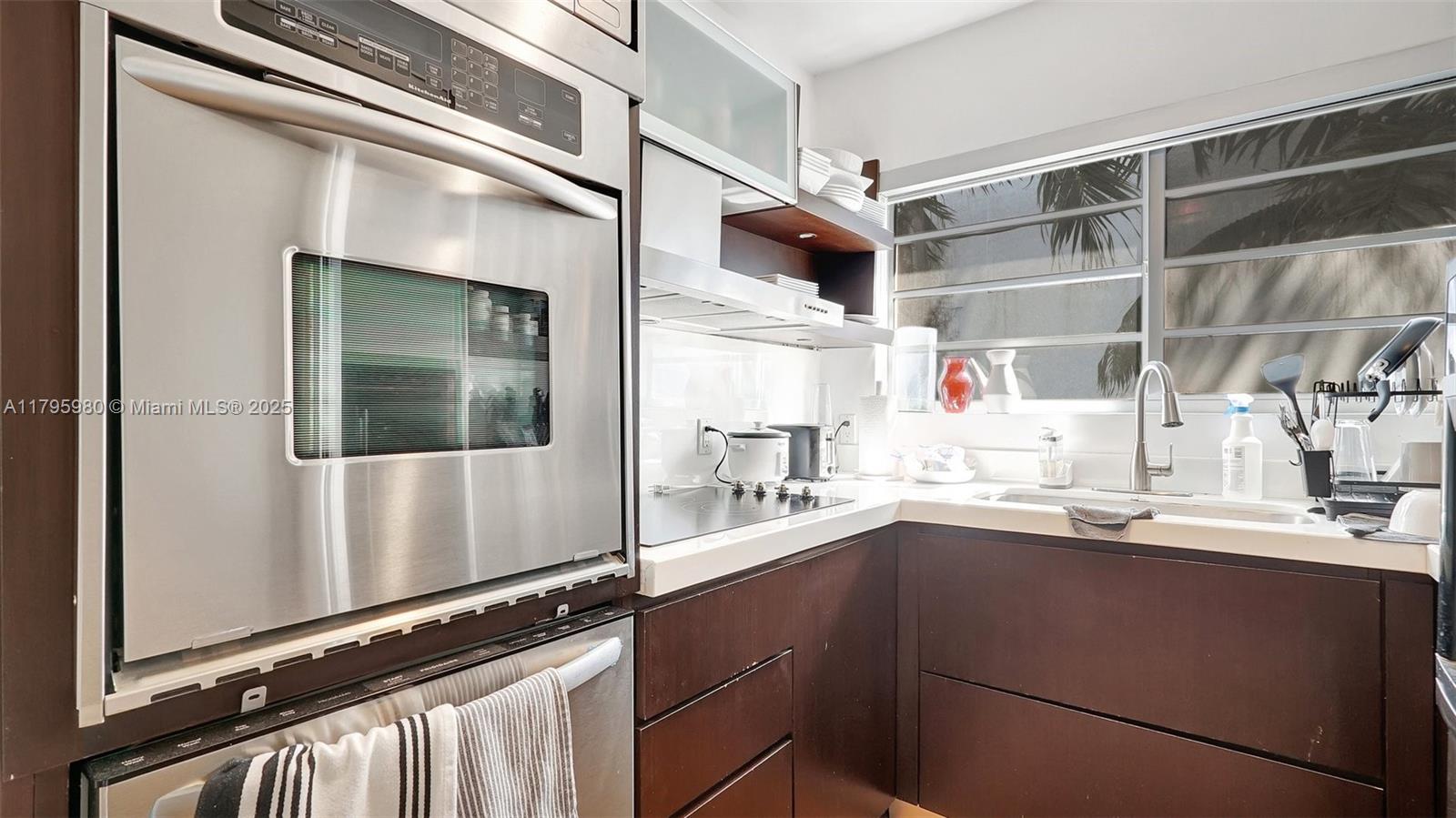 Flamingo-Lummus Miami Beach, FL 33139 - Photo 20 of 63 a kitchen with a sink and cabinets