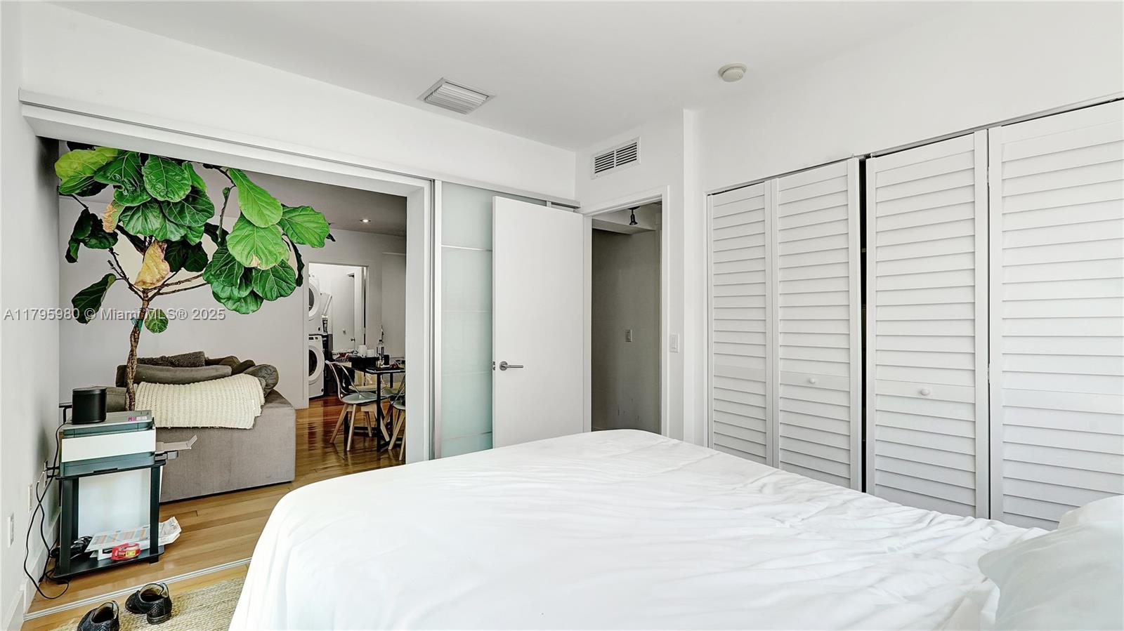 Flamingo-Lummus Miami Beach, FL 33139 - Photo 35 of 63 a bedroom with a bed and a large window