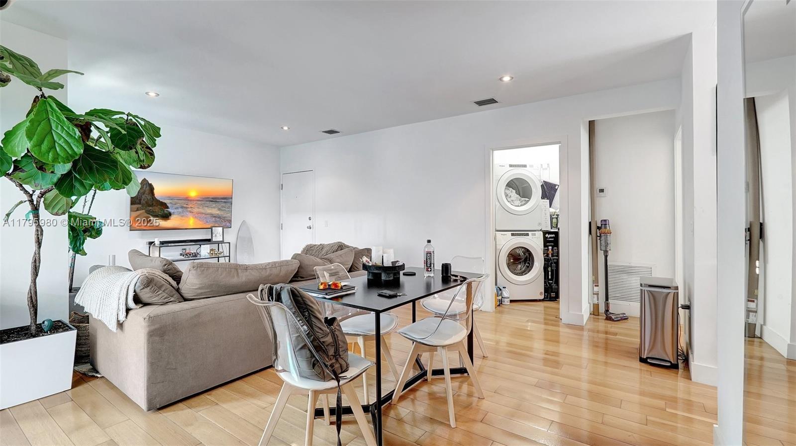 Flamingo-Lummus Miami Beach, FL 33139 - Photo 10 of 63 a living room with furniture and a flat screen tv
