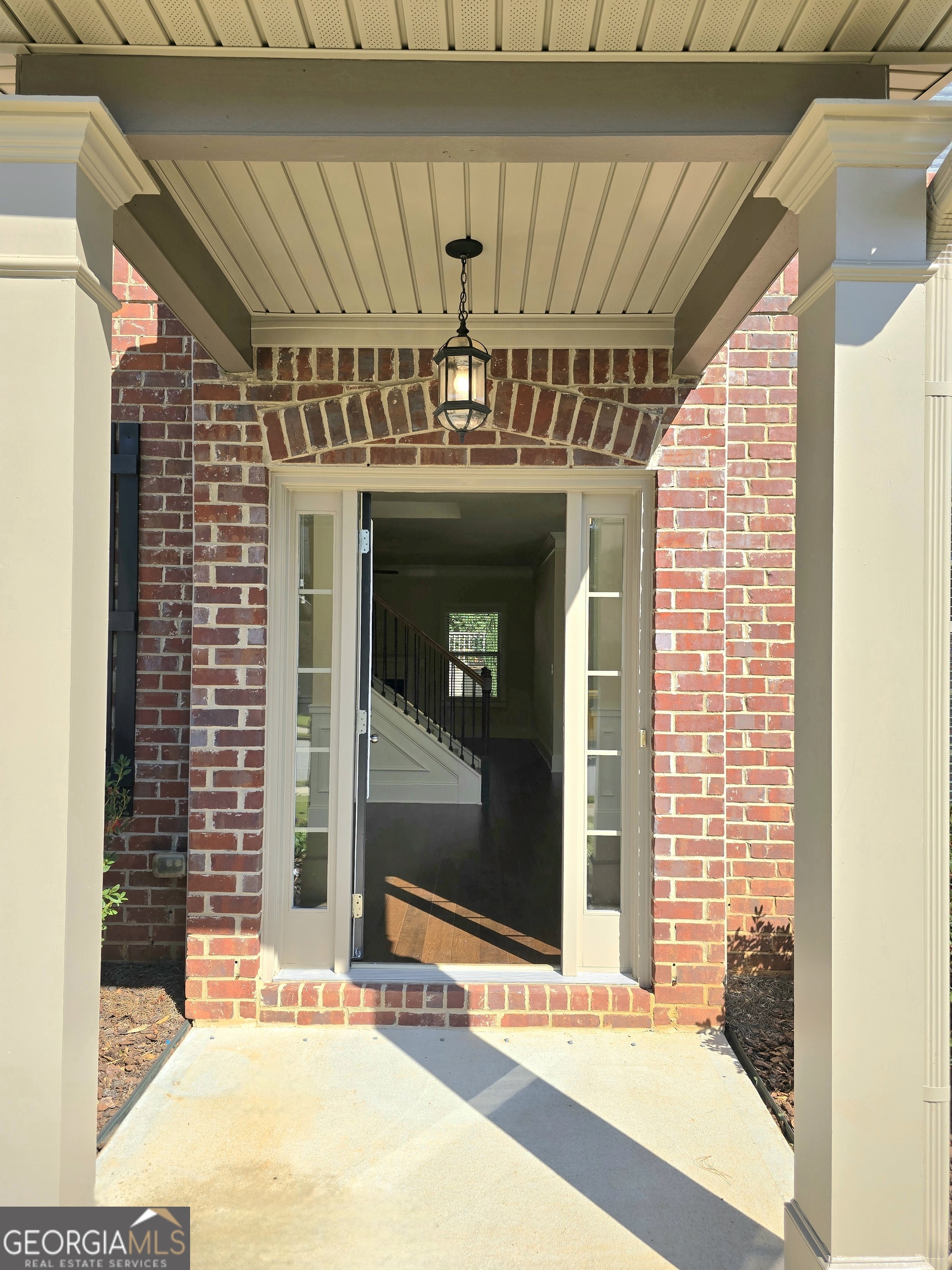 9 Ravine Drive Newnan, GA 30265 - Photo 2 of 46 a view of a building with a door and a porch