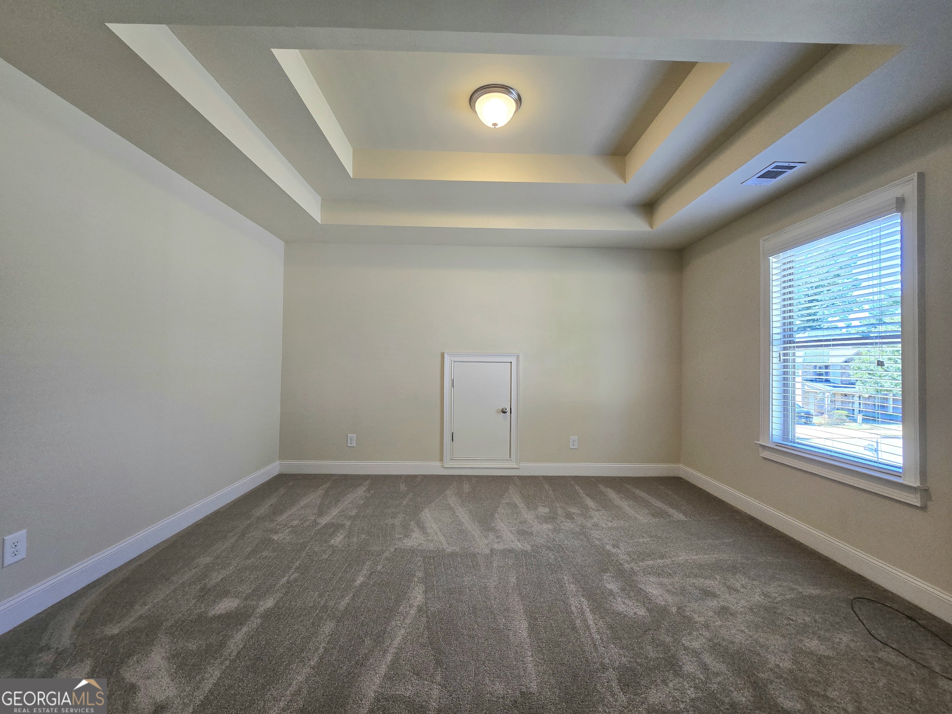 9 Ravine Drive Newnan, GA 30265 - Photo 25 of 46 a view of an empty room and window