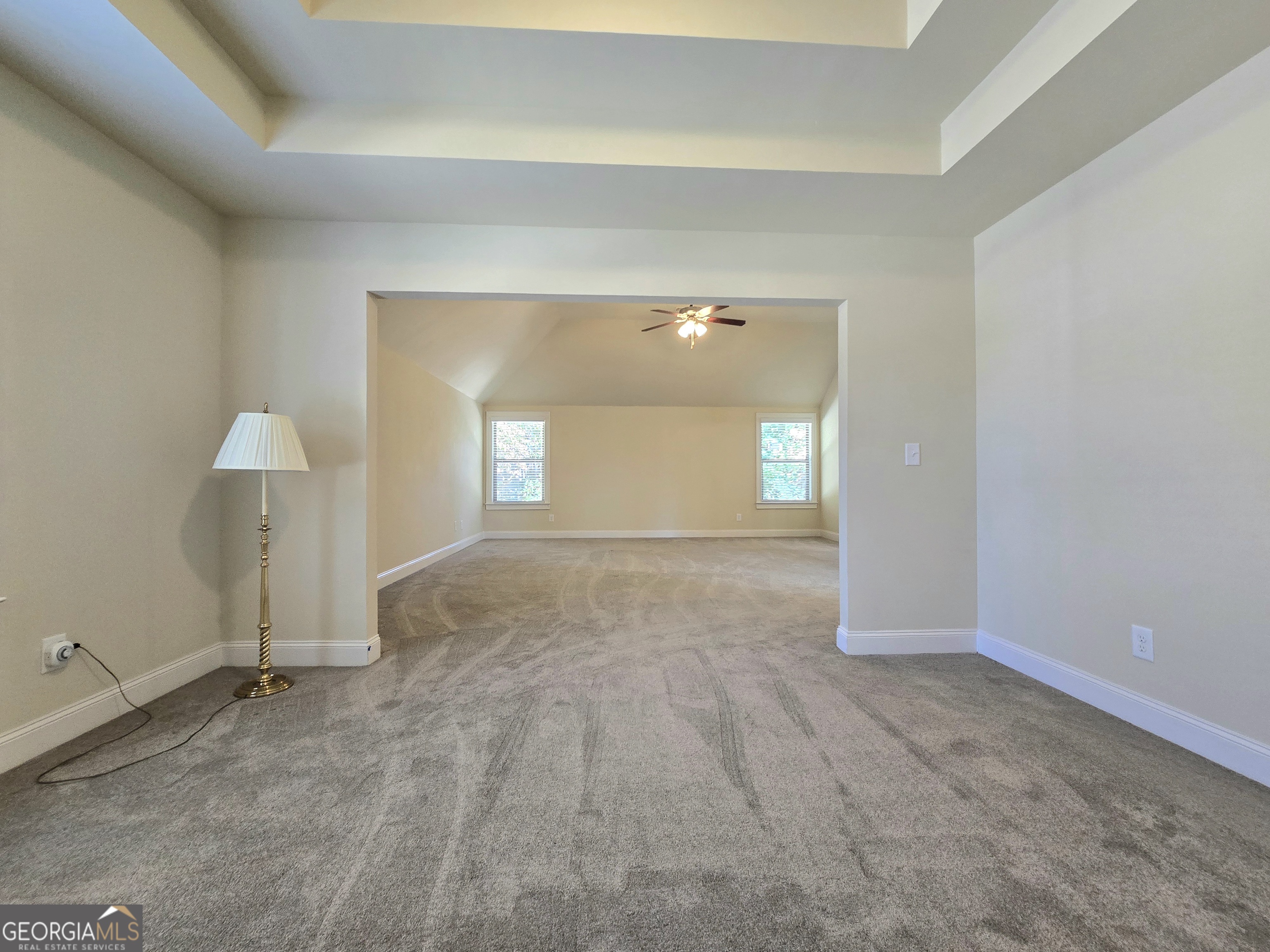 9 Ravine Drive Newnan, GA 30265 - Photo 26 of 46 an empty room with a empty space and windows
