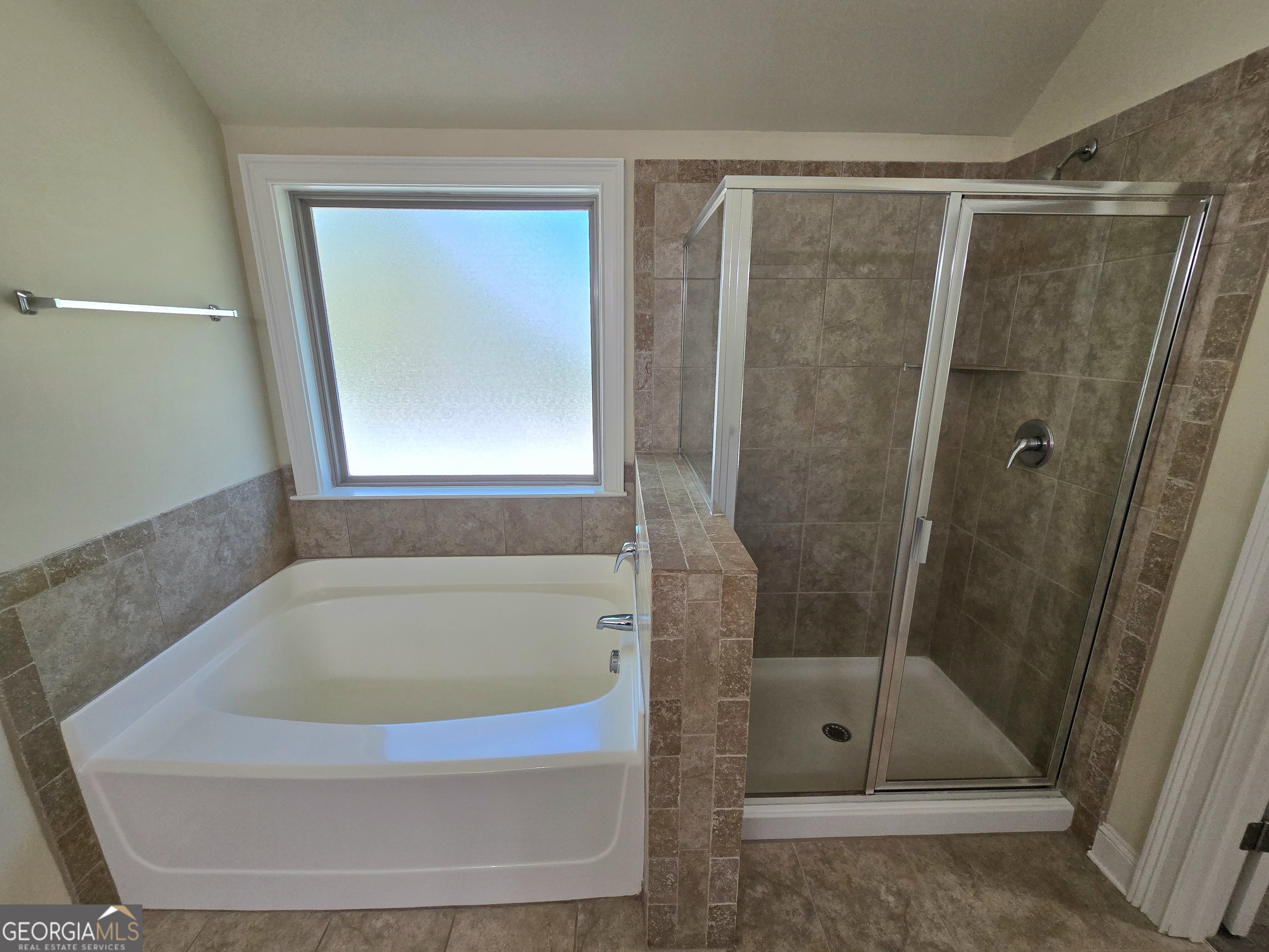 9 Ravine Drive Newnan, GA 30265 - Photo 29 of 46 a bathroom with a shower and a tub