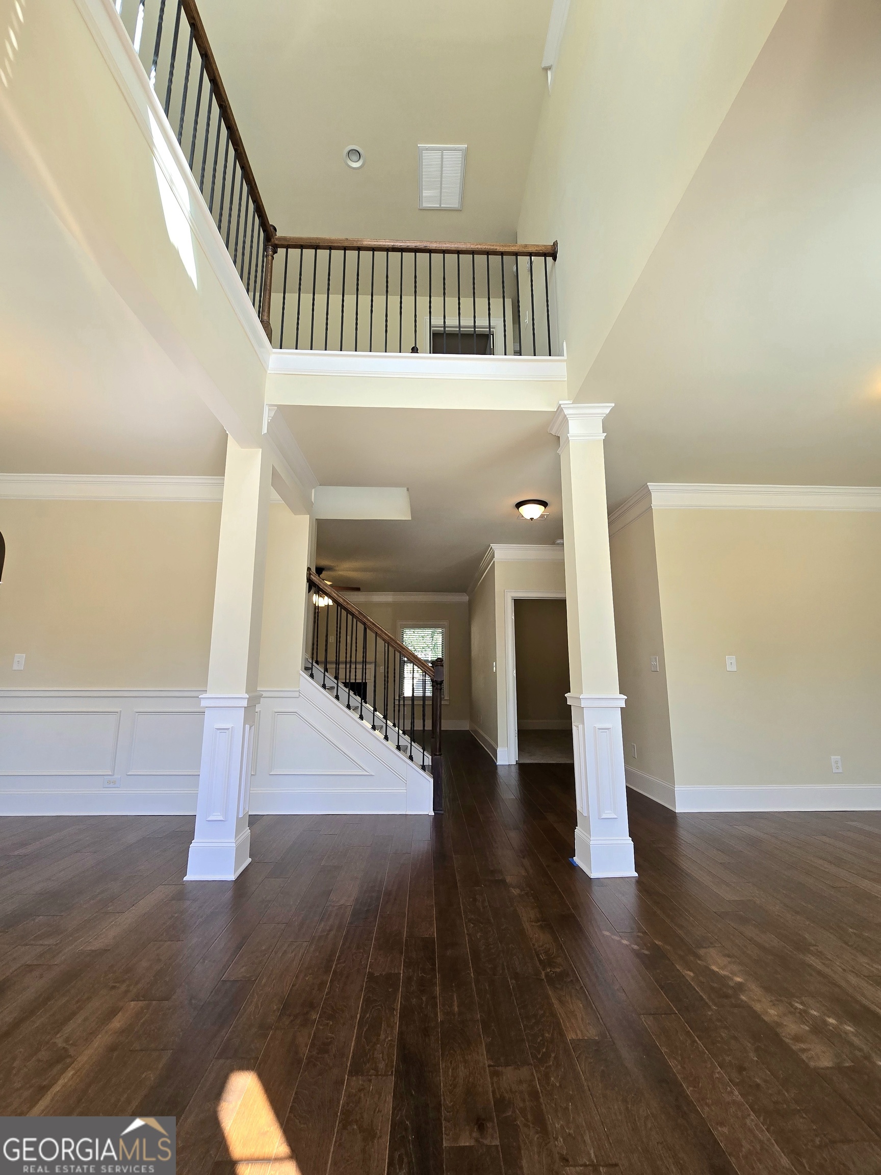 9 Ravine Drive Newnan, GA 30265 - Photo 3 of 46 a view of entryway and hall with wooden floor