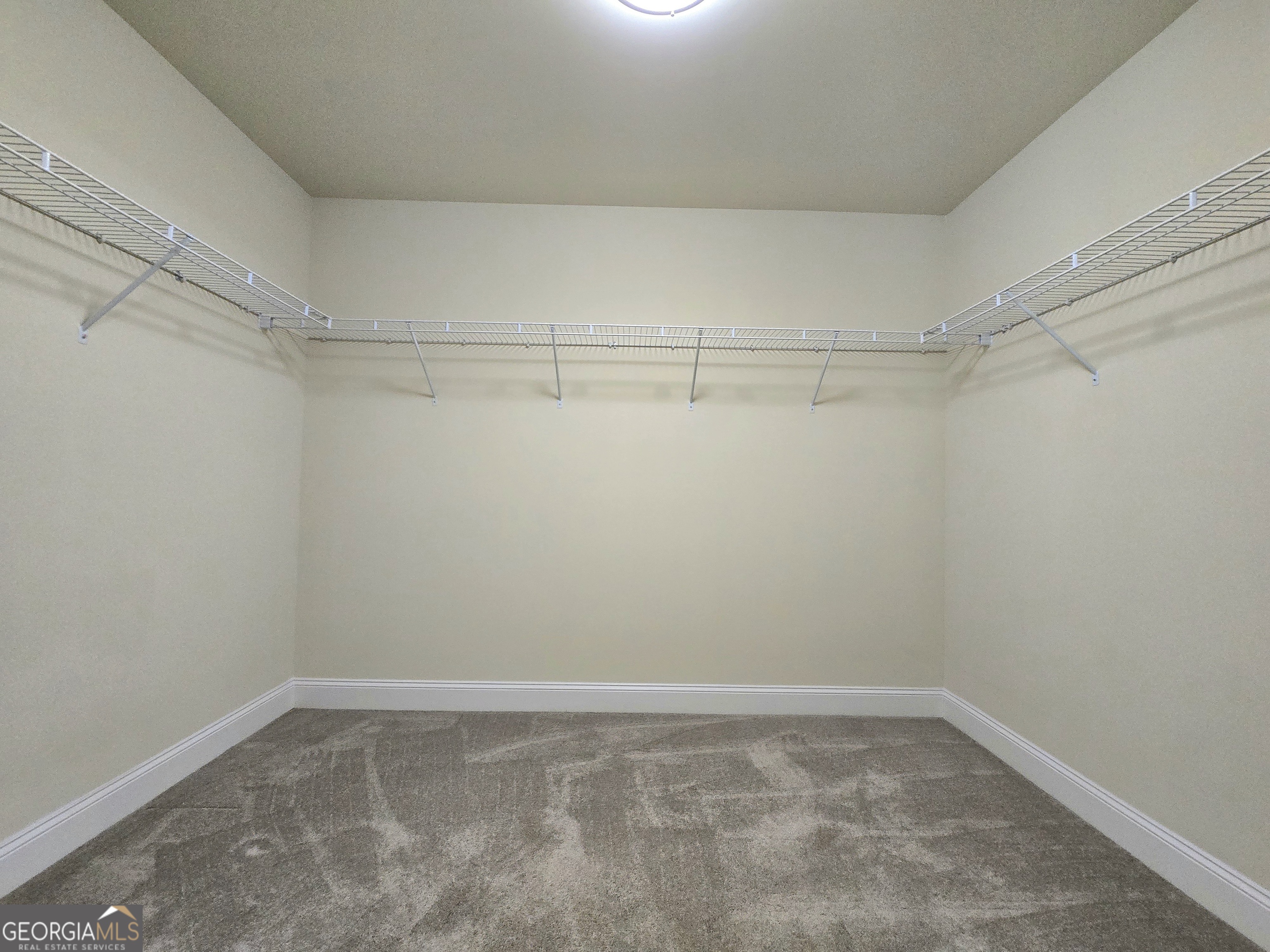 9 Ravine Drive Newnan, GA 30265 - Photo 31 of 46 a view of a room with racks on the wall