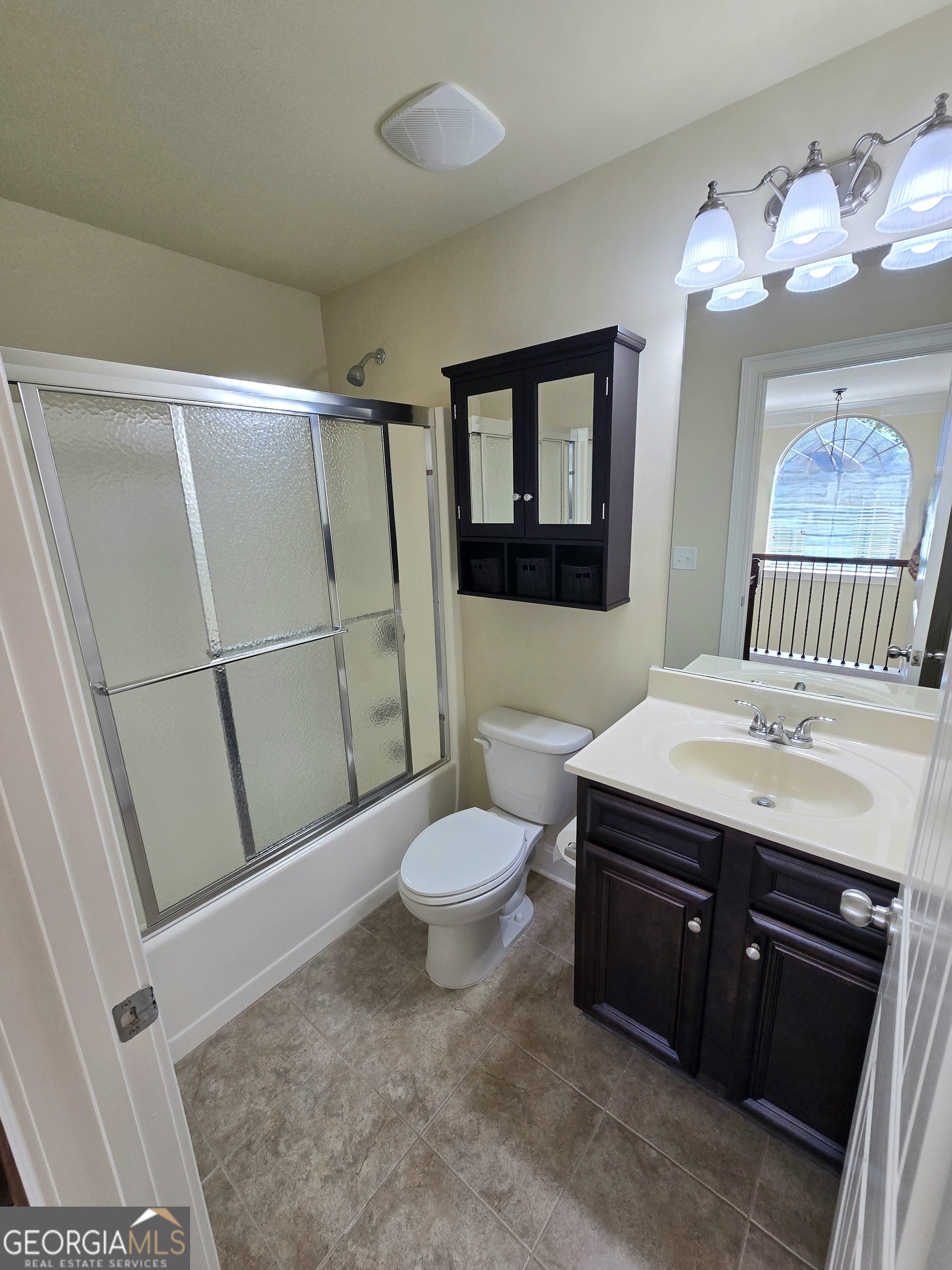 9 Ravine Drive Newnan, GA 30265 - Photo 36 of 46 a bathroom with a sink a toilet and shower
