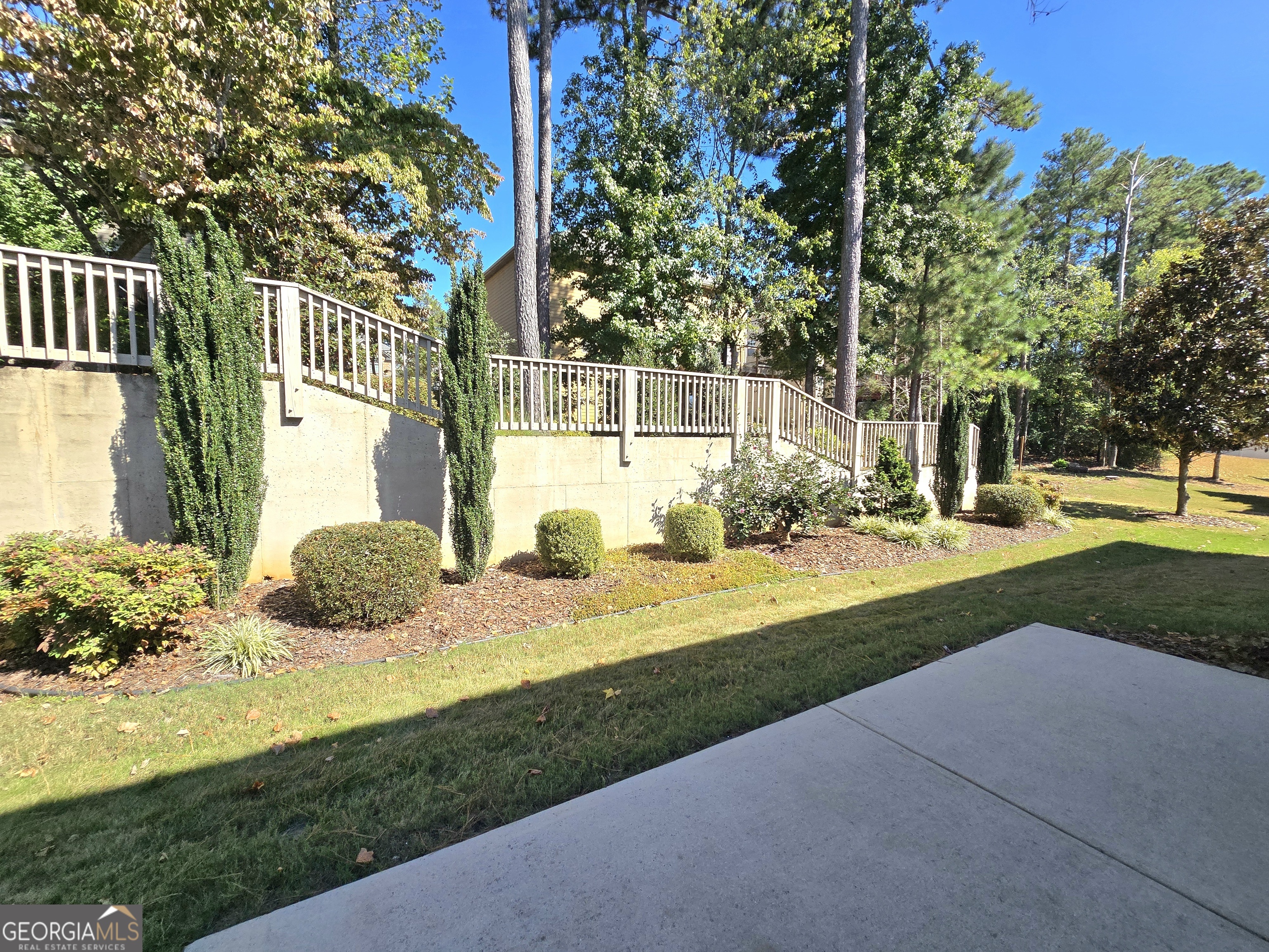 9 Ravine Drive Newnan, GA 30265 - Photo 41 of 46 a view of a house with backyard and sitting area