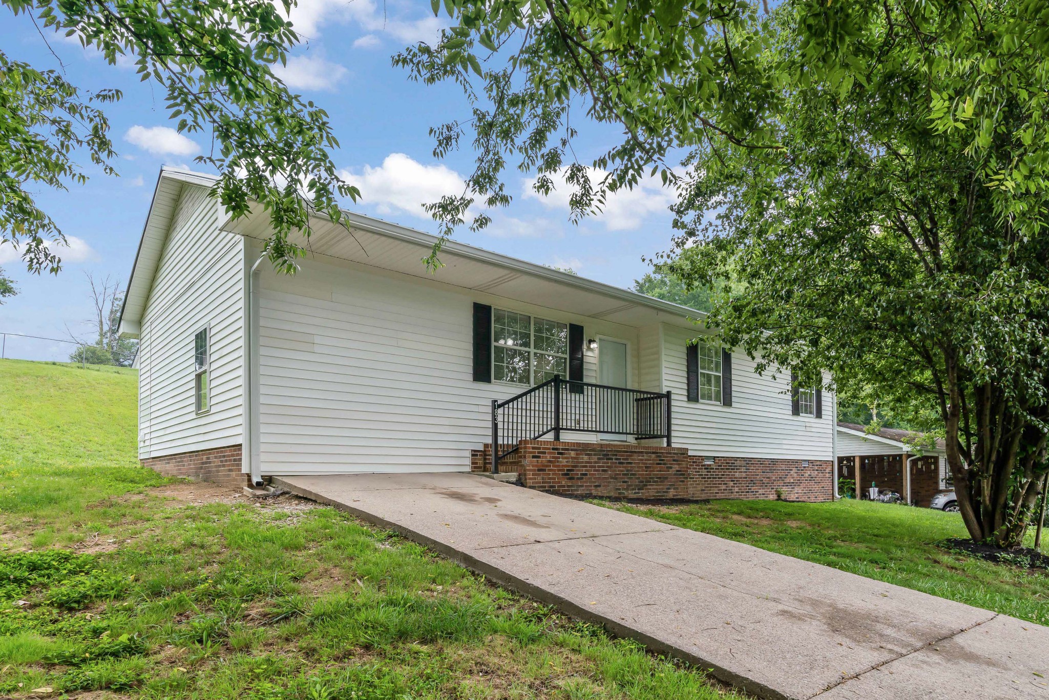 183 Cedar Street Carthage, TN 37030 - Photo 1 of 18 a view of a house with a yard