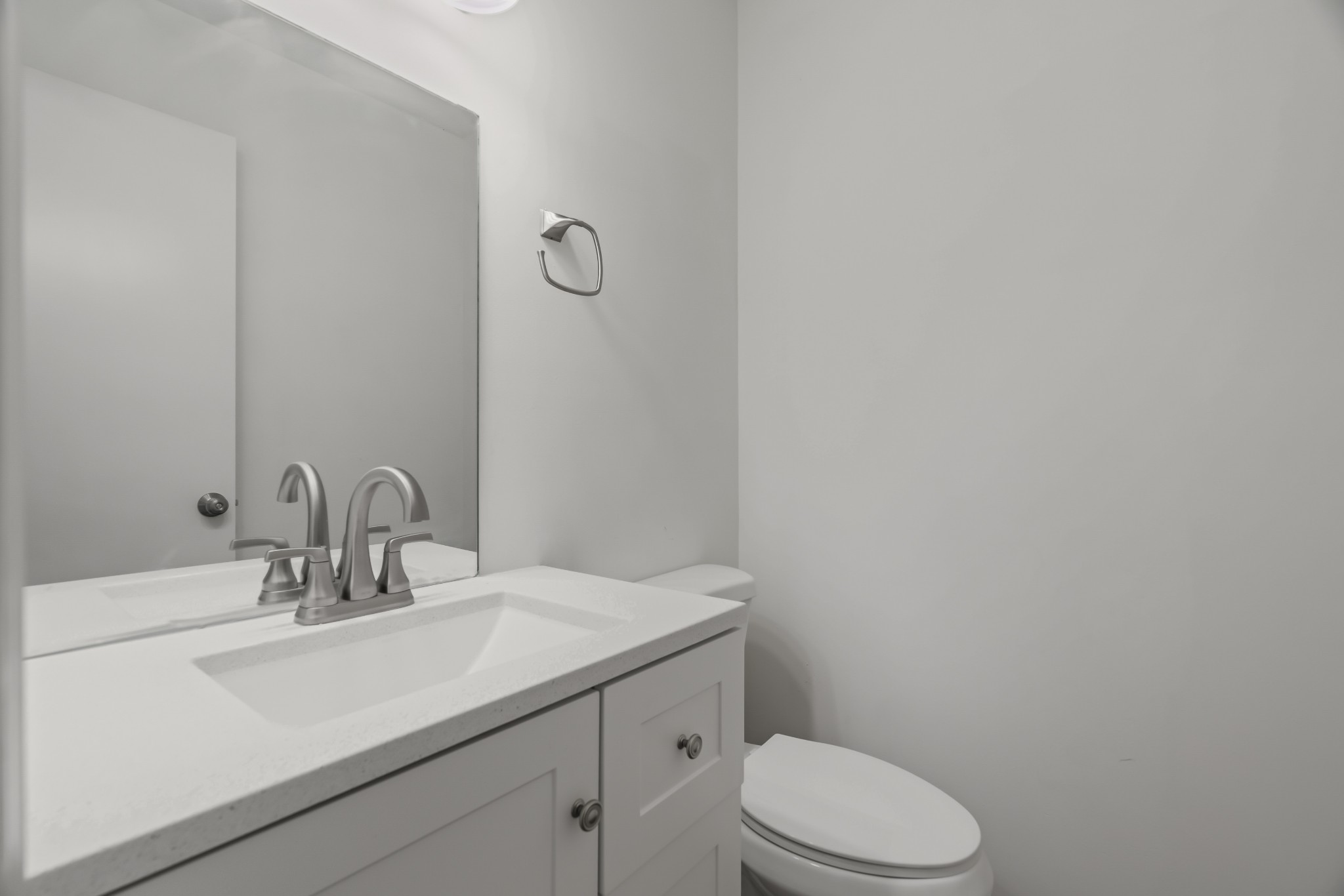 183 Cedar Street Carthage, TN 37030 - Photo 14 of 18 a bathroom with a sink a toilet and mirror