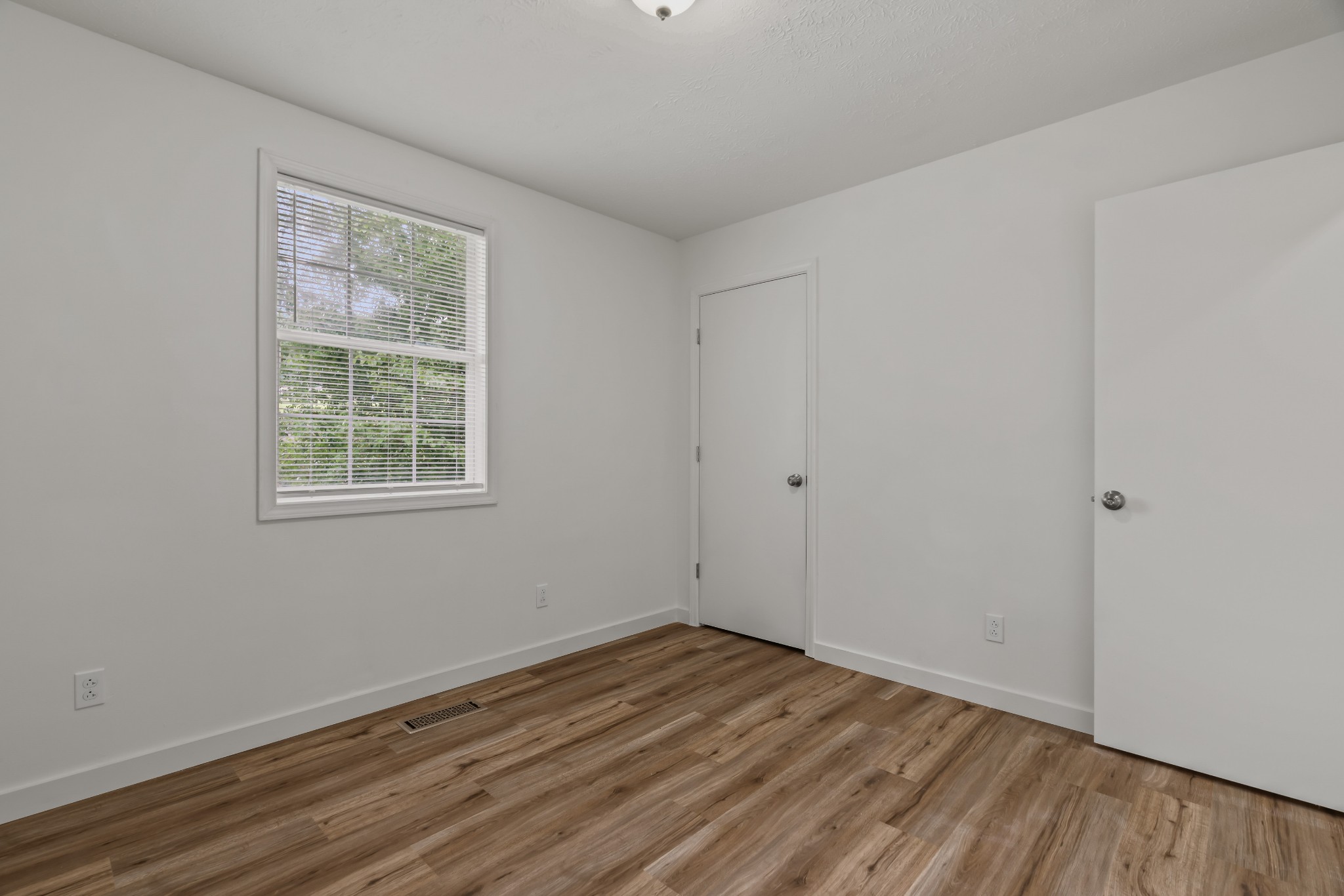 183 Cedar Street Carthage, TN 37030 - Photo 16 of 18 wooden floor in an empty room