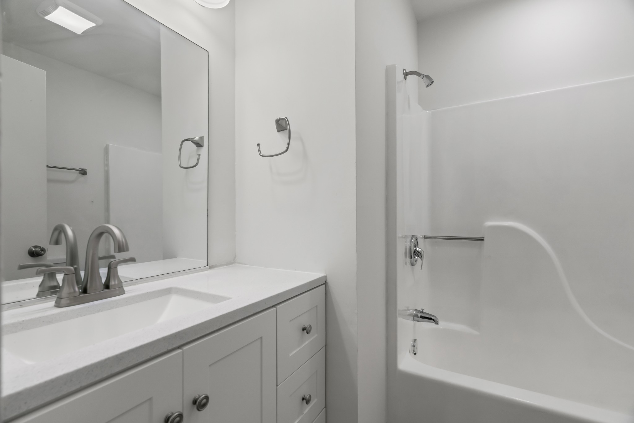 183 Cedar Street Carthage, TN 37030 - Photo 17 of 18 a bathroom with a sink and a mirror