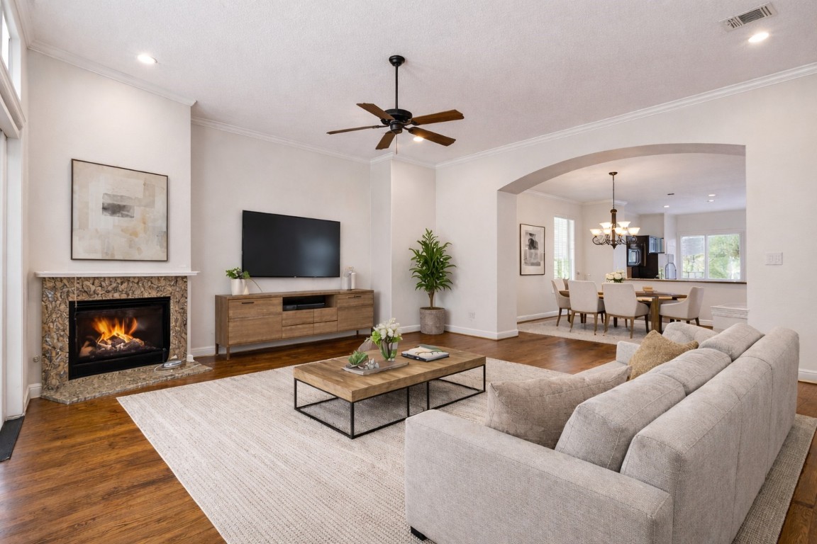 5509 Darling Street Houston, TX 77007 - Photo 5 of 36 Open concept living space features hardwood floors and newly painted walls - virtually staged
