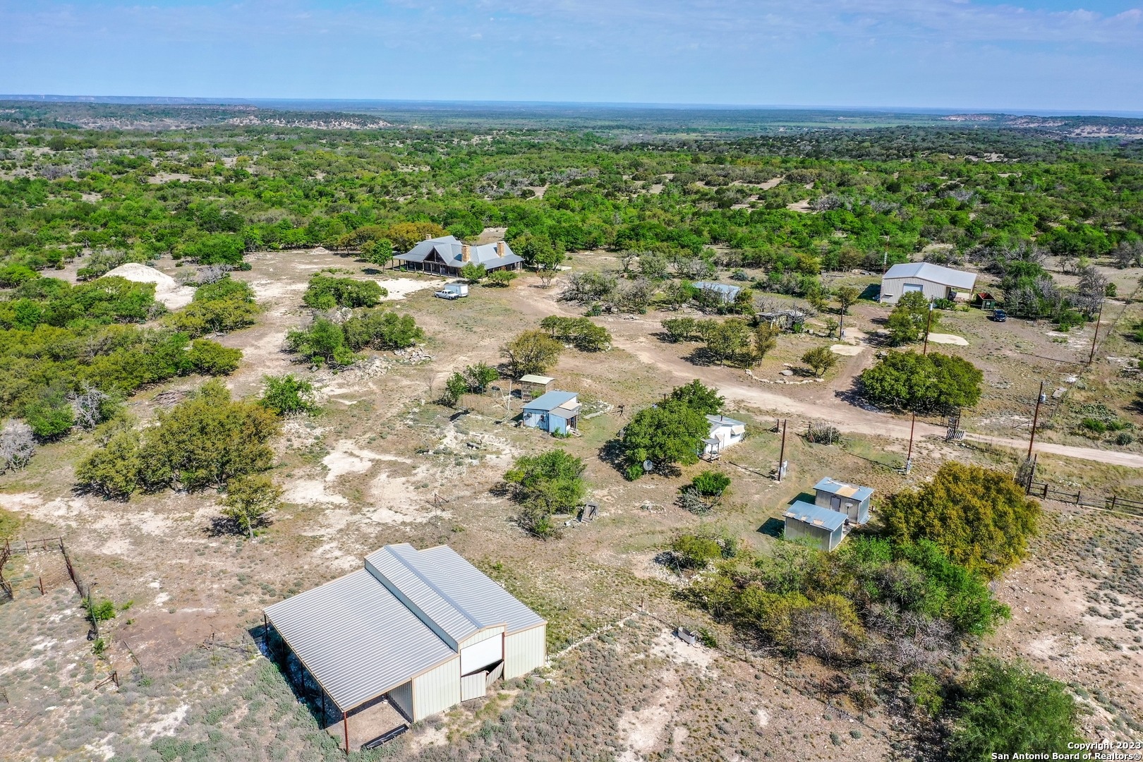 514 Centerfork Road Doss, TX 78618 - Photo 29 of 51 a view of a yard with a garden